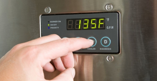 A resident turning down their home water heater